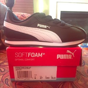 Sold Two (2) pairs of Puma sneakers size 10c